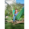 Green outdoor hammock on wooden frame