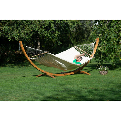 Double size hammock in park on wooden hammock stand