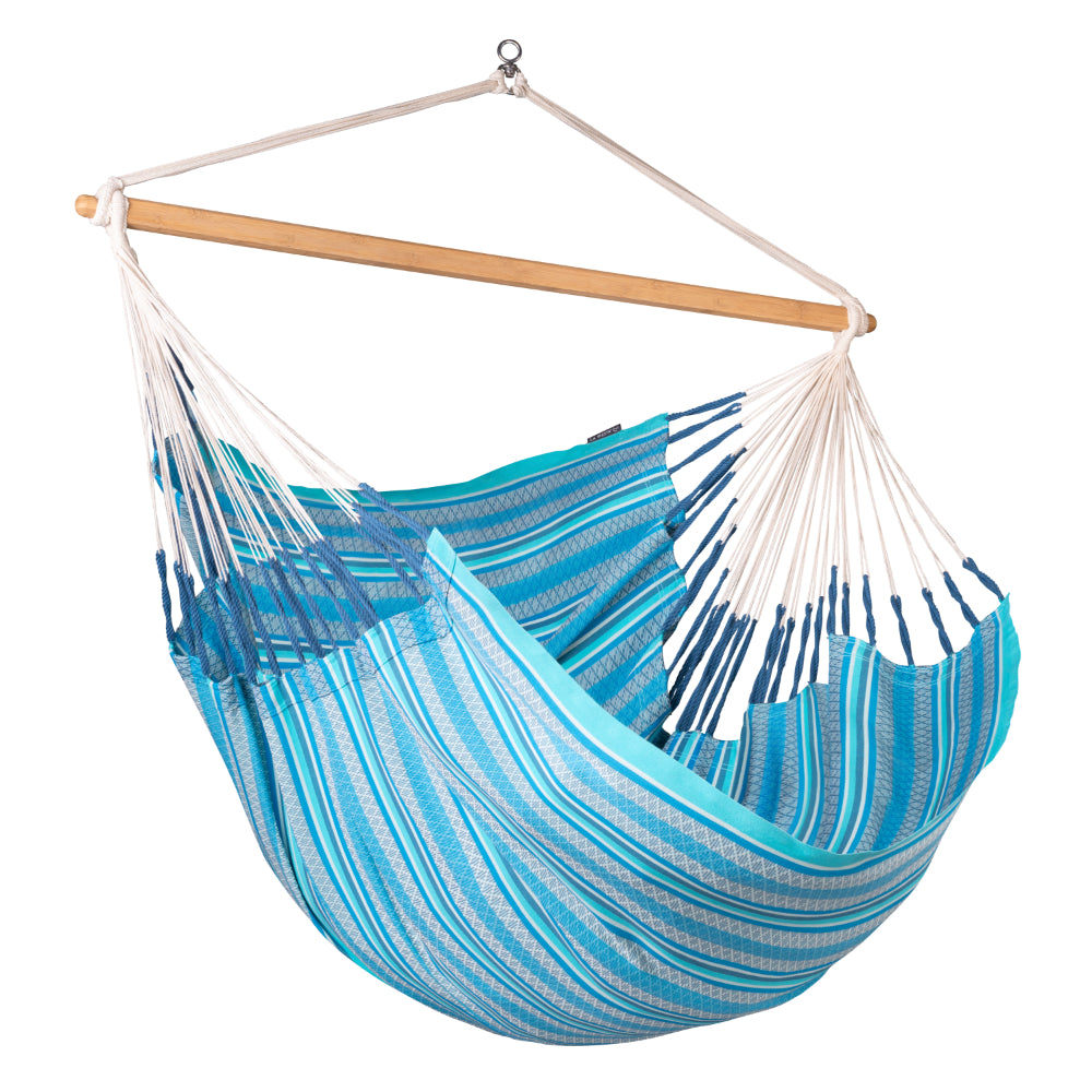 Blue and white striped hammock chair with wooden rod on a white background