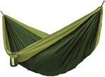 Green hammock made of nylon on a white background