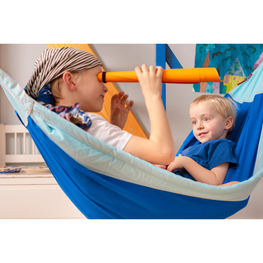 Children playing in child friendly hammock