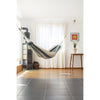 Indoor hammock hung from walls
