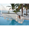 large Mexican hammock hanging over swimming pool