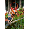 Garden hammock swing chair hanging by pond