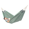 Couple sleeping in large green and white hammock
