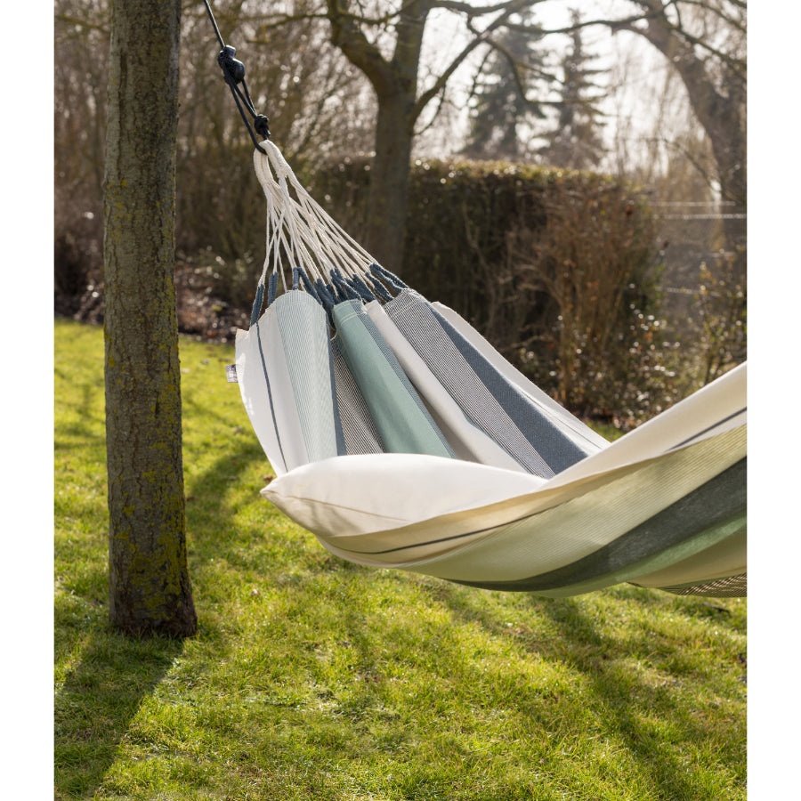 Garden cotton hammock hung from trees
