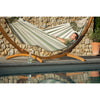 hammock on stand beside pool