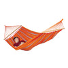 Man sleeping in large fabric hammock