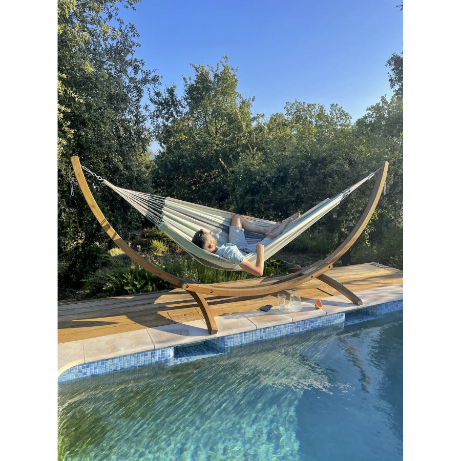 striped organic cotton hammock on wooden hammock stand
