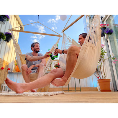Enjoying hammock time and drinks with friends